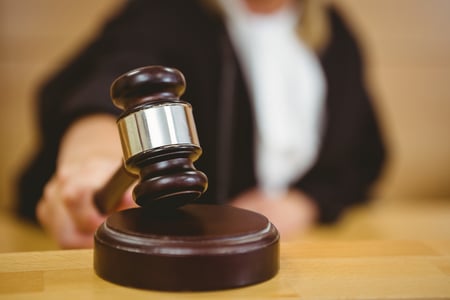 judge slams gavel in courtroom