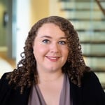 A headshot of Emily K. Burge
