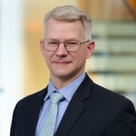 A headshot of Mark J. Consilvio