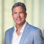 A headshot of Randy J. Pritzker